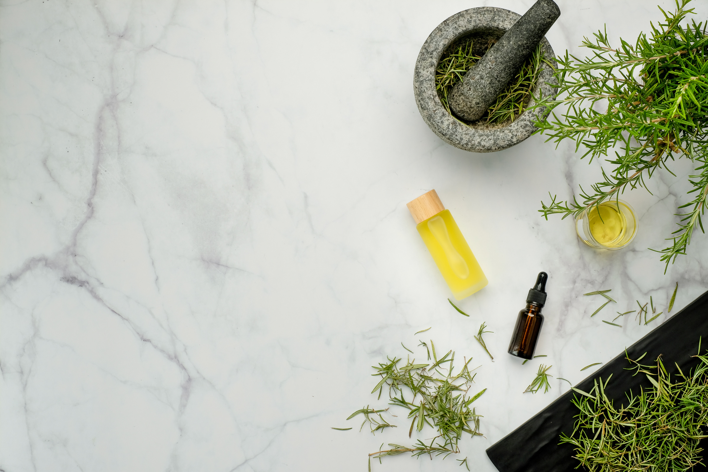 aromatherapy rosemary essential oil for skincare and health care. Wellness and well being concept.